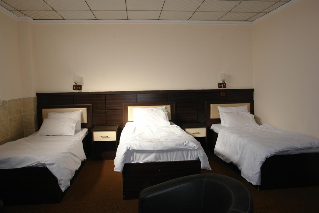 Madera Hotel Arbil Quarto foto